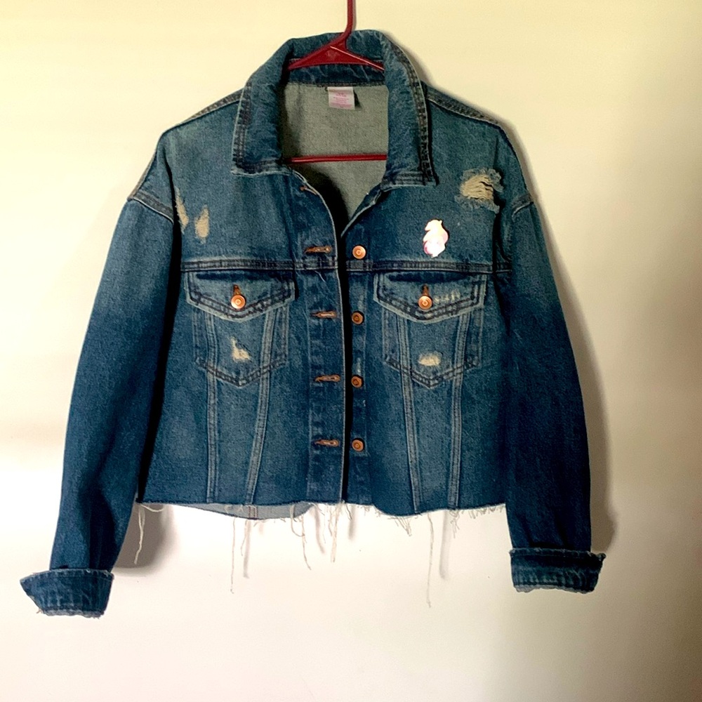 No Boundaries distressed Jean jacket is size large. Has punk Ariel pin